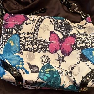 Beautiful coach Carly butterfly charm handbag